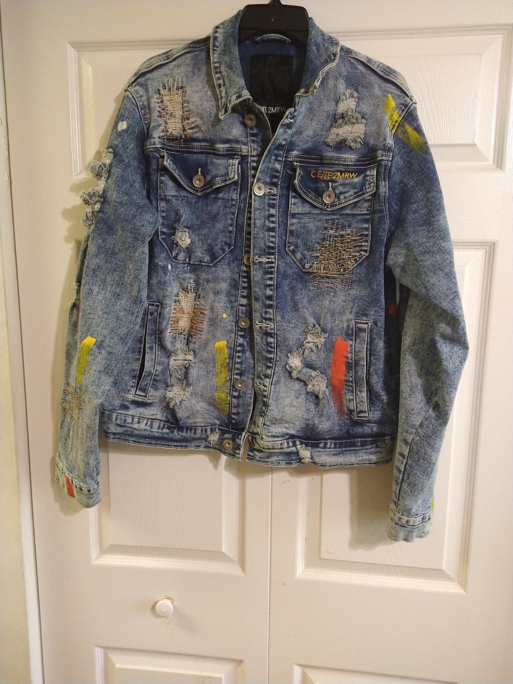 Distressed Blue Denim Jacket with Color Paint Accents